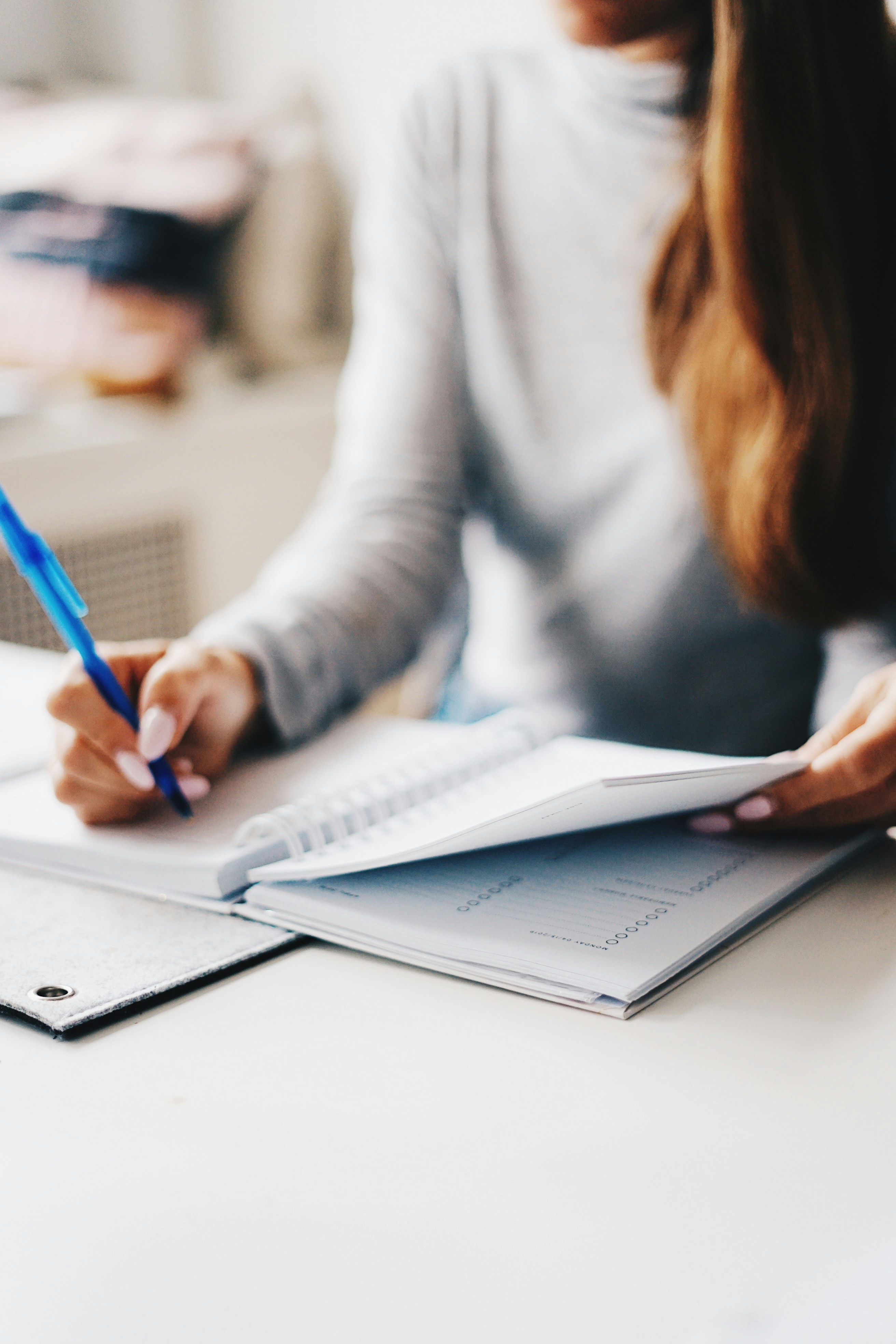lady writing in a planner