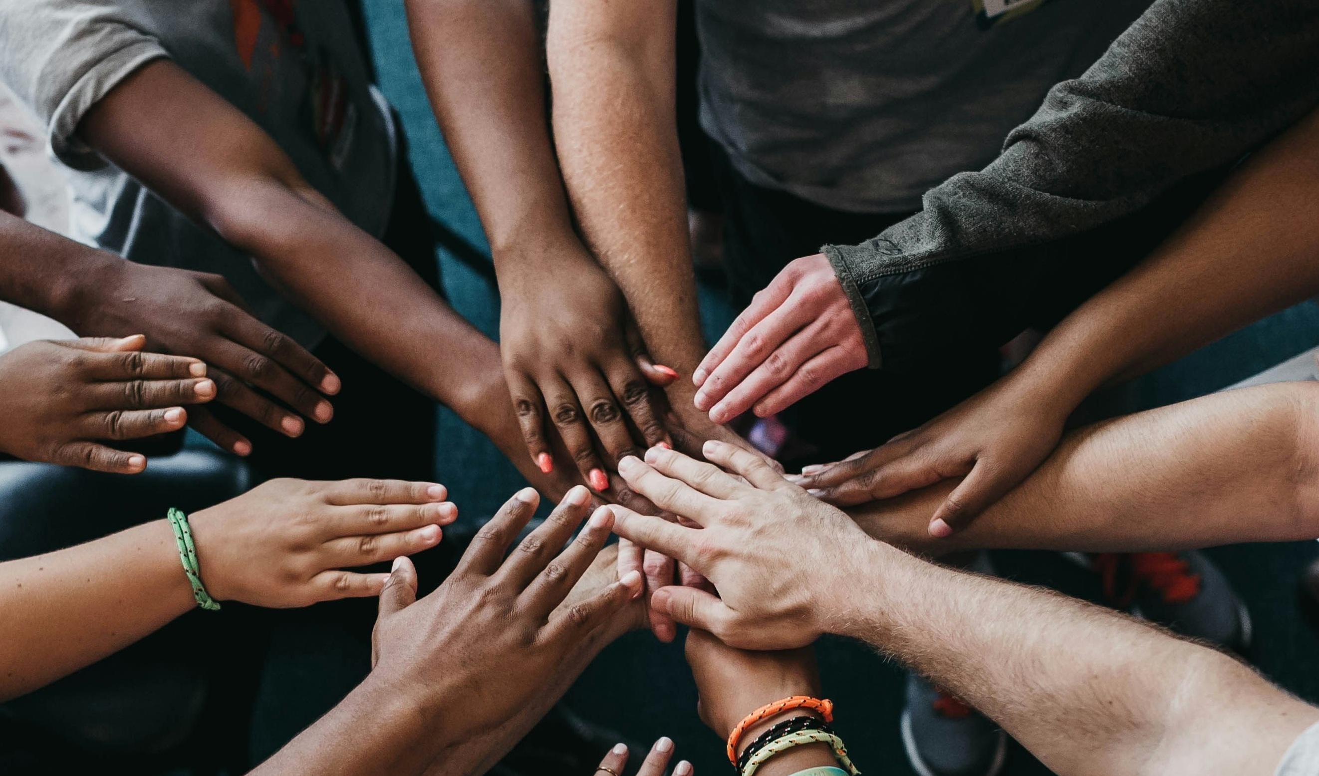 Team hands in
